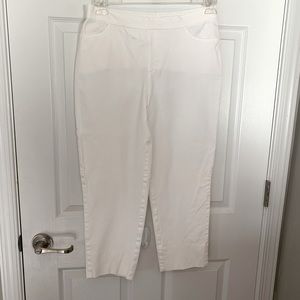 White capri pants with pockets.  Size 10 with back slit